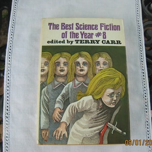 May include: The Best Science Fiction of the Year #8, edited by Terry Carr, book cover with a green background and an illustration of a group of girls with blonde hair, one of the girls is holding a knife.