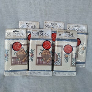 May include: Five rolls of self-stick wallpaper border with a fruit and checkered pattern. The border is removable, no paste or water is needed. Each roll is 8.4 square feet, 5 yards long and 6.75 inches wide. The border is 0.78m² (4.57m x 17.2cm).