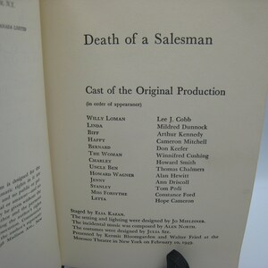 May include: A black and white printed page from a book titled "Death of a Salesman" with the cast of the original production listed in order of appearance. The cast includes Lee J. Cobb, Mildred Dunnock, Arthur Kennedy, Cameron Mitchell, Don Keefer, Winnifred Cushing, Howard Smith, Thomas Chalmers, Alan Hewitt, Ann Driscoll, Tom Pedi, Constance Ford, and Hope Cameron.