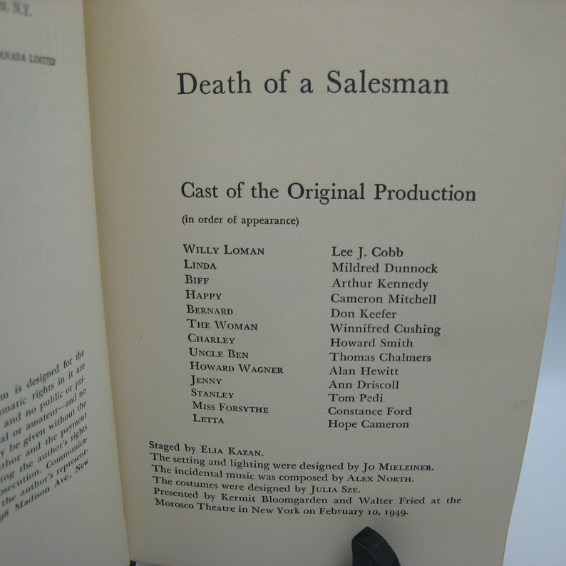 May include: A black and white printed page from a book titled "Death of a Salesman" with the cast of the original production listed in order of appearance. The cast includes Lee J. Cobb, Mildred Dunnock, Arthur Kennedy, Cameron Mitchell, Don Keefer, Winnifred Cushing, Howard Smith, Thomas Chalmers, Alan Hewitt, Ann Driscoll, Tom Pedi, Constance Ford, and Hope Cameron.