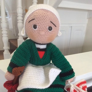 Crocheted Bécassine with accessories. Downloadable PDF file (French)