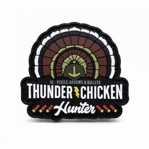 May include: A black patch featuring a turkey design with a brown, white, and tan tail. The text "THUNDER CHICKEN Hunter" is displayed in white, with a yellow lightning bolt. The Instagram handle "IG: PIXELS.ARROWS.N.BULLETS" is also visible.