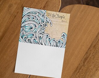 May include: A white card with a blue and white wave design on the top half. The bottom half is blank. The top half of the card features the text "We the People" and "Article I".
