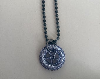 Wheel resin cast  pendant on large black ball chain