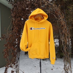 Pastel yellow champion hoodie cheap