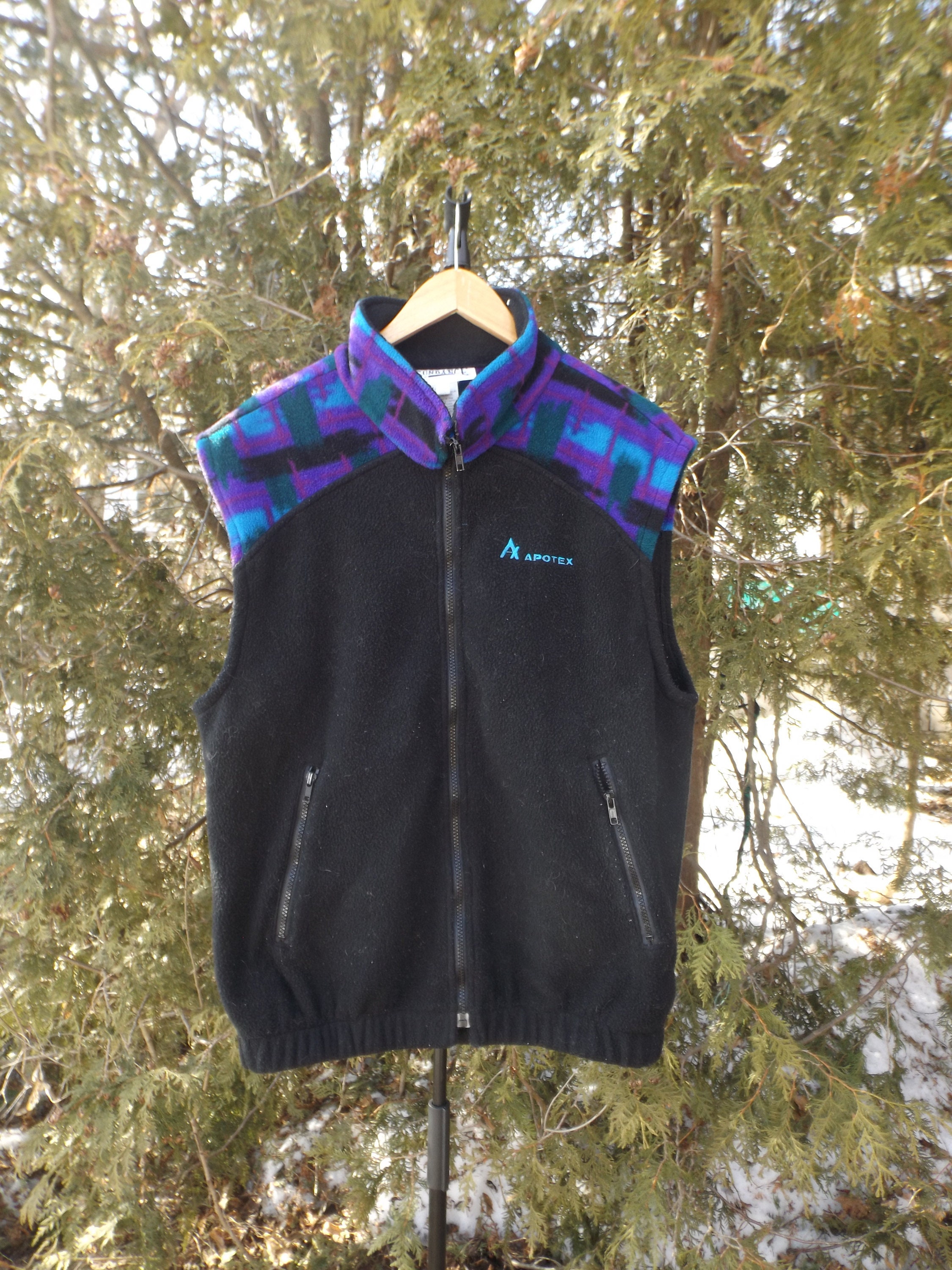 purple sleeveless fleece jacket