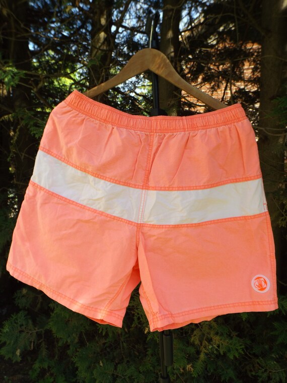 peach swim trunks