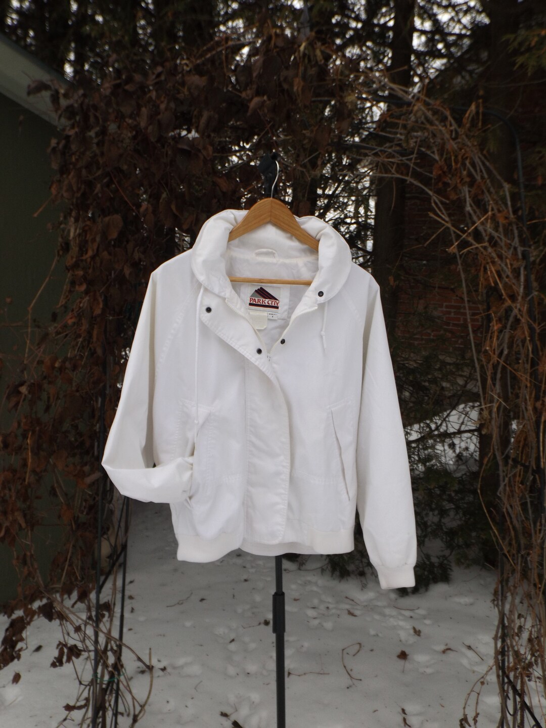 Pink grey and store white windbreaker