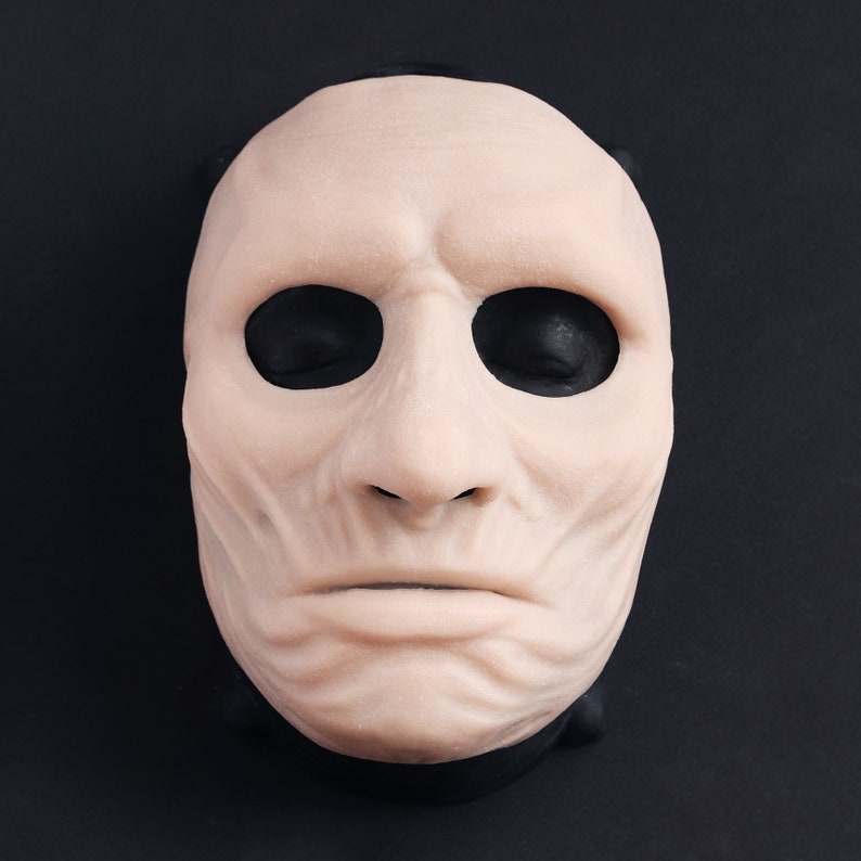 Ghoul Mask in vanilla shade on a black surface