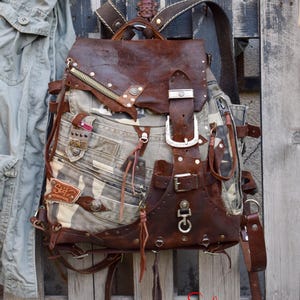 Mochila militar de camuflaje de cuero compacta de alta gama, estilo vintage, vaquera, boho, grunge, estilo cartero, para viajes, ciudad, aventura y arte