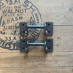 Pair of 1890s J.G. Wilson Mfg Cast Iron Cabinet Handles image 1