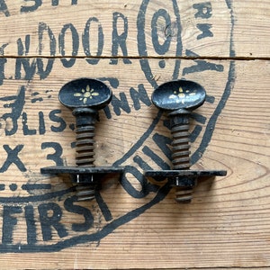 Antique Pair of Hand-Stenciled Cast Iron Set Screws image 3