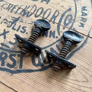 Antique Pair of Hand-Stenciled Cast Iron Set Screws image 2