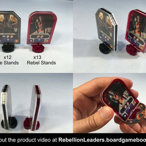 May include: Two sets of acrylic character stands for the Star Wars: Rebellion board game. The stands are clear with black and red accents. The stands are designed to hold character cards. There are 12 Empire stands and 13 Rebel stands.
