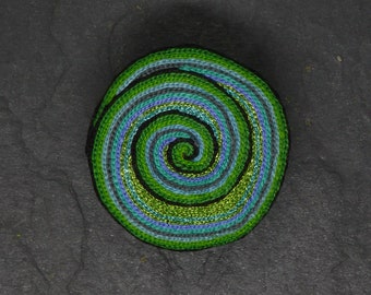 Hand-embroidered spiral brooch