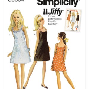 Peut inclure: Patron de couture Simplicity S9594 avec trois robes. Les robes sont une robe à imprimé floral bleu clair, une robe noire et une robe à imprimé floral orange. Le patron comprend le texte "Simplicity Jiffy" et "Easy Cut Easy Sew".