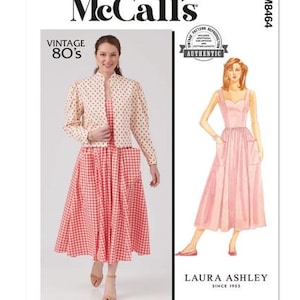 May include: McCall's M8464 sewing pattern envelope featuring a vintage 80s style outfit. The image displays a cream-colored jacket with a small red floral print and a red and white gingham dress. Includes a Laura Ashley illustration of the dress.