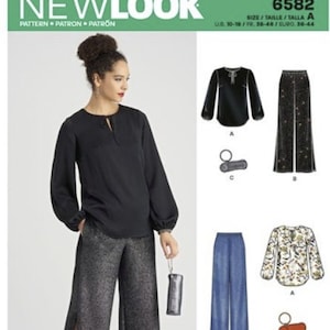 May include: A sewing pattern for a black blouse with a keyhole neckline and long sleeves, a pair of wide-leg pants with a slit on each side, and a pair of denim pants. The pattern is for sizes 10-18, 38-44, and 30-44.
