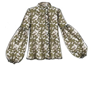 May include: A green blouse with a white floral print and long, puffed sleeves. The blouse has a button-up front and a high collar.