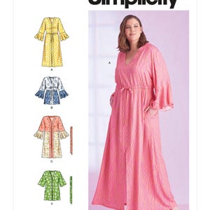 May include: Simplicity sewing pattern S9603 featuring a long, pink and orange zebra-print robe with a V-neckline, long flared sleeves, and a drawstring waist. The pattern envelope displays four variations of the robe in different colors and patterns.
