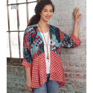 May include: A colorful, open-front jacket with a patchwork design. The jacket features a mix of patterns in red, blue, teal, and white. The sleeves are three-quarter length. The image also shows the text "Simplicity Pattern 8172".