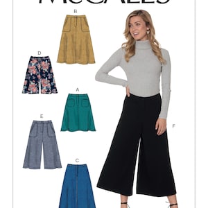 May include: McCall's sewing pattern M7475 for a skirt with six different styles. The styles include a black, a teal, a blue, a mustard yellow, a gray and white plaid, and a floral print.