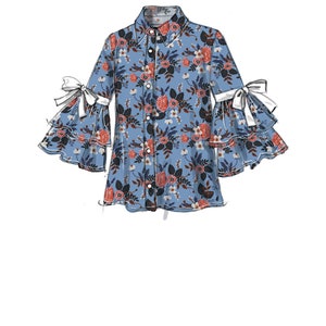 May include: A blue and white floral print button-up shirt with a collar and long sleeves. The sleeves have a ruffle detail and a white bow at the cuff.