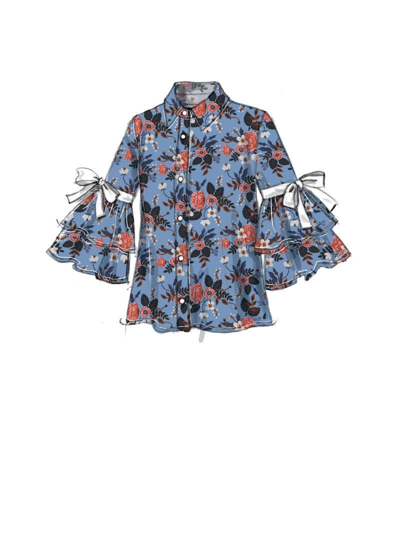 May include: A blue and white floral print button-up shirt with a collar and long sleeves. The sleeves have a ruffle detail and a white bow at the cuff.