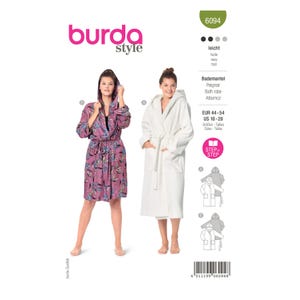 May include: A Burda Style sewing pattern envelope 6094 for a hooded bathrobe. The cover displays two variations: one in a purple floral print and one in solid white. Text includes 'easy', 'Bath robe', and size range EUR 44-54, US 18-28.