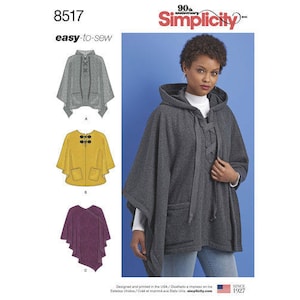 May include: Simplicity sewing pattern 8517, featuring a hooded cape with a lace-up front and pockets. The image also shows illustrations of cape variations in gray, yellow, and purple. The Simplicity logo is at the top.