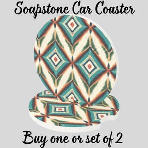 May include: Two soapstone car coasters with a geometric pattern in teal, cream, orange, and brown. The coasters have a circular shape with a cutout for a car cup holder. Text at the top reads "Soapstone Car Coaster" and at the bottom "Buy one or set of 2".