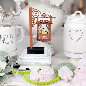 Disney tangled Snuggly Duckling Pub Sign, Snuggly Duckling Self-Standing Decorations