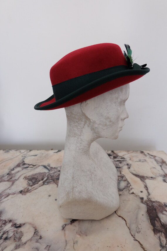 dark red bowler hat