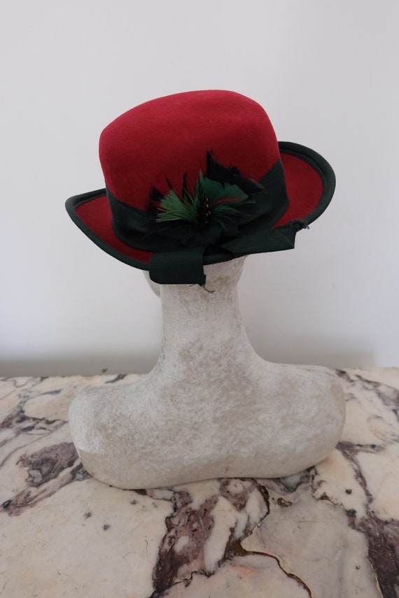dark red bowler hat