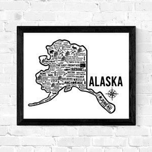 May include: A black and white typography map of Alaska with the state name and a compass rose. The map is filled with city and town names, geographic features, and other points of interest.