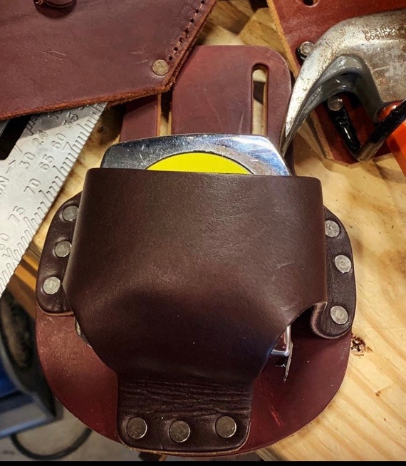 Soporte de cinta métrica para cinturones herramientas - España