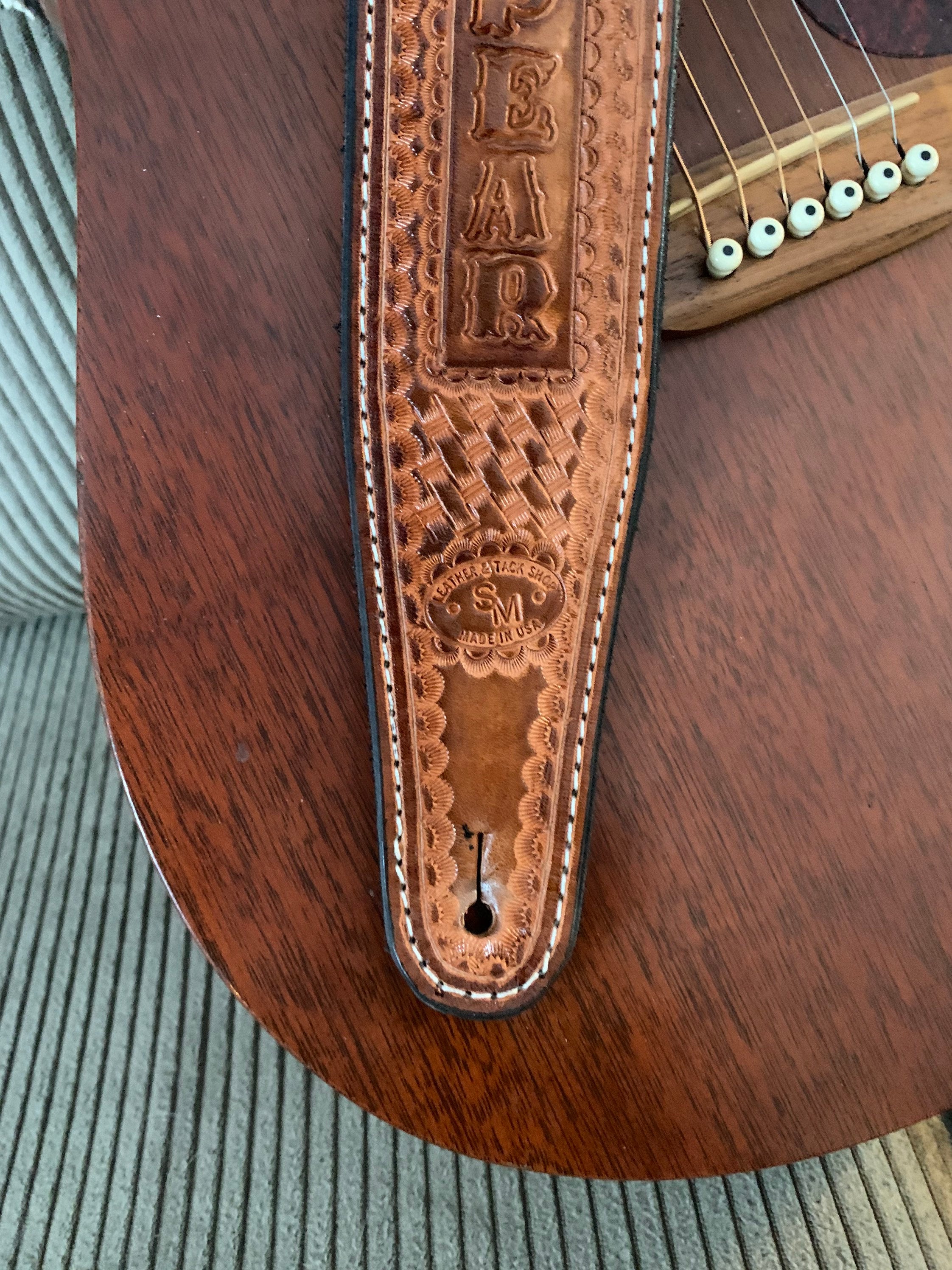 hand-tooled-leather-guitar-strap