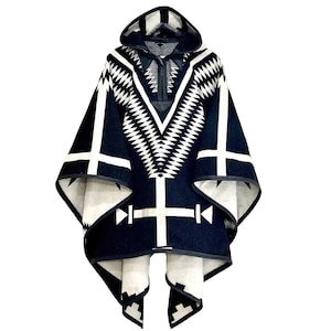 Riding Poncho in Los Ojos, black leather trim. Reversible.