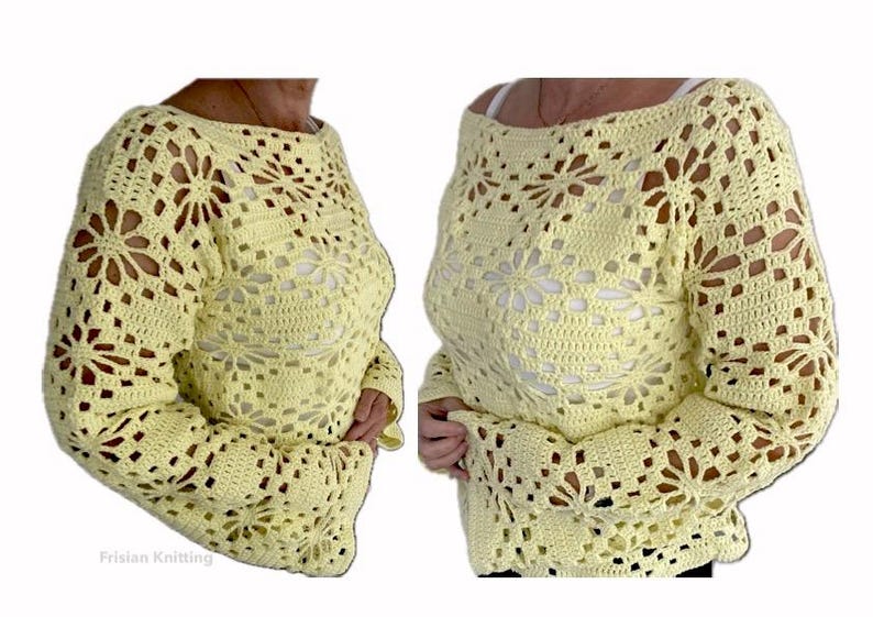 Puede incluir: Un su&eacute;ter de crochet amarillo con un patr&oacute;n de encaje. El su&eacute;ter tiene mangas largas y un ajuste holgado.