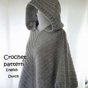 K&ouml;nnte beinhalten: Graues H&auml;kel-Poncho-Muster mit Kapuze in Englisch und Niederl&auml;ndisch. Das Muster enth&auml;lt Anleitungen zum H&auml;keln eines Kapuzenponchos mit einem einfachen Stichmuster.