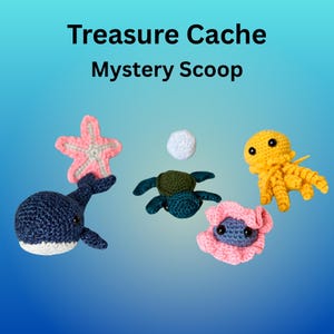 May include: Crocheted sea creatures including a blue whale, pink starfish, green turtle, yellow octopus, and pink sea anemone. The text "Treasure Cache Mystery Scoop" is at the top.