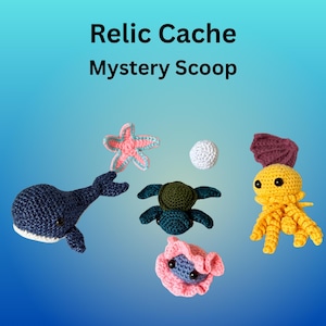 May include: A collection of handmade crochet sea creatures, including a whale, starfish, turtle, clam, ball, and jellyfish. The items are in shades of blue, pink, yellow, and green. The text "Relic Cache Mystery Scoop" is at the top.