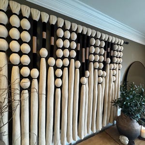 Fiber Wall Art, wrapped large tassels hanging, over coach decor
