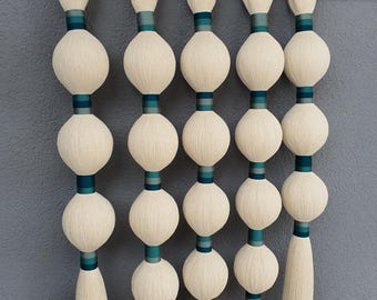 Arte de pared de macramé con borlas: decoración bohemia para el hogar