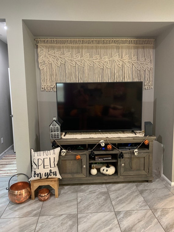 Tapestry behind tv shop