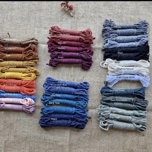 May include: Assortment of 18 colors of cotton rope, including terracotta, maroon, merlot, grape, denim dear blue, light teal, dark teal, navy, dark grey, light grey, black, beige, off-white/natural, bright snow white, emerald green, dark olive green, light sage, and dark sage.