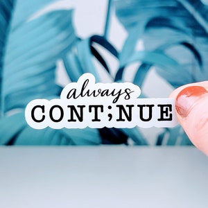 May include: White sticker with black text that reads "always CONTINUE".