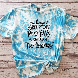May include: A blue and white tie-dye t-shirt with the text "= a large = :GROUP OF: people is called a "no thanks" "