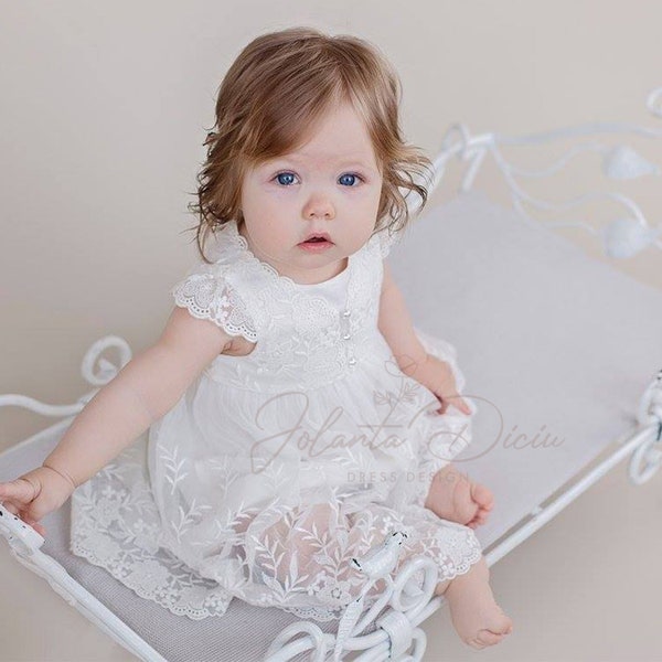 Lace baptism dress with pearl buttons. Short christening dress