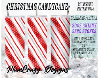 Könnte beinhalten: Ein digitales Design mit einem roten und weißen Zuckerstangenmuster mit silbernen Punkten. Das Design ist mit "Christmas Candy Cane" beschriftet und soll als Strass- oder Sublimationsvorlage für einen Becher verwendet werden. Das Design ist für 20 oz Skinny Becher und verwendet SS20 Strasssteine.